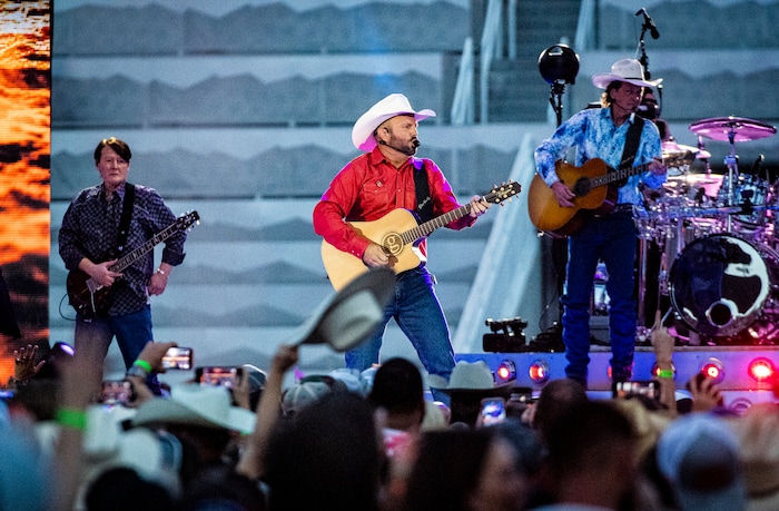 (Isaac Hale | Special to The Tribune) Garth Brooks performs with his band during a stop on their stadium tour held at Rice-Eccles Stadium in Salt Lake City on Saturday, July 17, 2021.