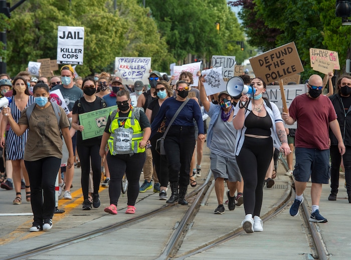 (Rick Egan  |  The Salt Lake Tribune)     Sofia Alcala leads the protesters as they march up Main Street in Salt Lake City, during a Justice for Bernardo rally on Thursday, June 25, 2020.