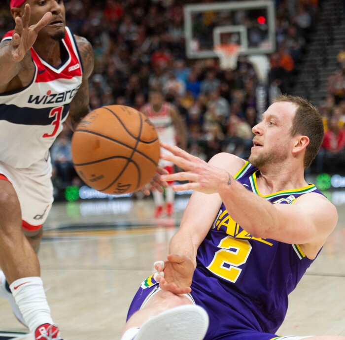 (Rick Egan  |  The Salt Lake Tribune)        Utah Jazz forward Joe Ingles (2) saves the ball as Washington Wizards guard Bradley Beal (3) defends, in NBA action between the Utah Jazz and the Washington Wizards, in Salt Lake City, Friday, March 29, 2019.