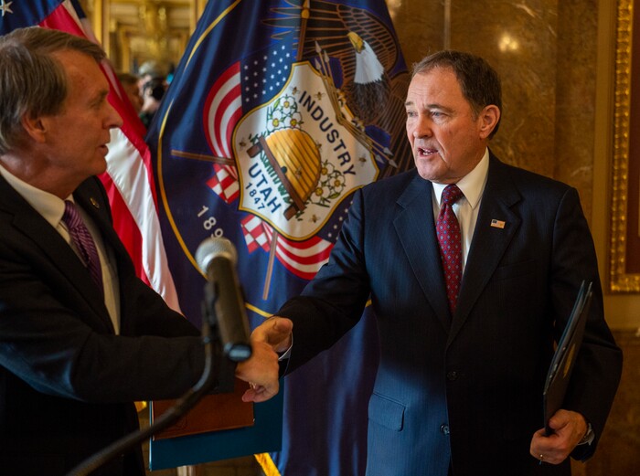 (Rick Egan  |  The Salt Lake Tribune)       Jeff Robbins Vice Chair, Salt Lake City-Utah committee for the Games, shakes hands with Gov. Gary Herbert, after a news conference announcing Utah's next steps towards an Olympic and Paralympic Winter Games, at the Utah State Capitol, Wednesday, Feb. 12, 2020.